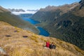 Hiking couple admiring scenic view of lakes Fergus, Lake Gunn and Livingstone mountain range Royalty Free Stock Photo