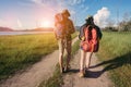 Hiking couple asian walking travel together at forest for camping