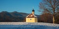 Hiking destination in the bavarian alps, little yellow chapel Maria Rast Royalty Free Stock Photo