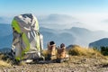 Hiking equipment. Backpack and boots on top of mountain Corno di Tres, Tresner Horn, Trentino, South Tyrol, Val di Non Royalty Free Stock Photo