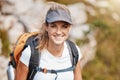 Hiking, fitness and exercise with a woman in the mountains, walking during a sunny summer day. Portrait, nature and Royalty Free Stock Photo