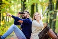 Hiking with friends. surprised girl drink mulled wine. camping and hiking. bearded man shocked watch with binoculars Royalty Free Stock Photo