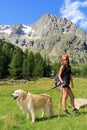 Hiking girl with her dog