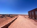 Hiking ground with wild grass in Horseshoe bend in Arizona with blue sky on the horizon Royalty Free Stock Photo