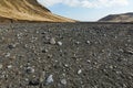 Hiking in Iceland, rugged valleys, black sediment Royalty Free Stock Photo