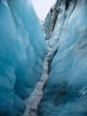 Walking through the ice walls on Fox Glacier, New Zealand Royalty Free Stock Photo