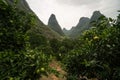 Hiking in the Karst mountains in Guilin region of South China, close to Xingping village, Li River Royalty Free Stock Photo