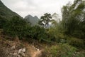 Hiking in the Karst mountains in Guilin region of South China, close to Xingping village, Li River Royalty Free Stock Photo