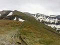 Hiking on a late day of winter on Bucegi mountains Royalty Free Stock Photo