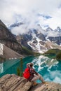 Hiking Man Looking at Moraine Lake and Rocky Mountains, Banff, Canada Royalty Free Stock Photo