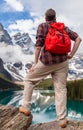 Hiking Man Looking at Moraine Lake & Rocky Mountains Royalty Free Stock Photo