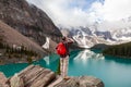 Hiking Man Looking at Moraine Lake & Rocky Mountains Royalty Free Stock Photo