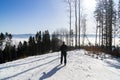 Hiking man in forest covered in snow during winter. Slovakia Royalty Free Stock Photo