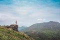 Hiking man standing on the rock, mountain peak. Sai Kung, Hong Kong Royalty Free Stock Photo