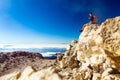 Hiking man or trail runner looking at view in mountains Royalty Free Stock Photo