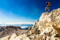 Hiking man or trail runner looking at view in mountains Royalty Free Stock Photo