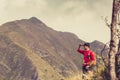 Hiking man or trail runner in mountains Royalty Free Stock Photo