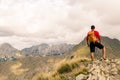 Hiking man or trail runner in mountains Royalty Free Stock Photo