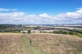 Hiking man walking in the field, Amazing view of Goring and Streatley, village town near Reading, England