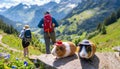 Hiking in mountain untain landscape concept. guinea pigs and couple hiking ,ai generated Royalty Free Stock Photo