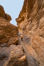 Hiking Through a Narrow Canyon