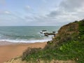 Hiking over the cliffs of Praia Dos Aveiros in Albufeira, Portugal