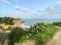 Hiking over the cliffs of Praia Dos Aveiros in Albufeira, Portugal