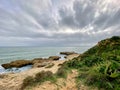 Hiking over the cliffs of Praia Dos Aveiros in Albufeira, Portugal