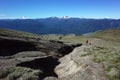 Hiking in Patagonia, Man solo walking up mountainside of volcano Puyehue in Puyehue National Park, Los Lagos Region Royalty Free Stock Photo