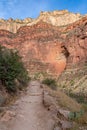 Hiking path along the massiv cliffs seen from Bright Angel hiking trail at South Rim of Grand Canyon National Park, Arizona Royalty Free Stock Photo