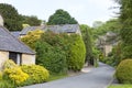 Hiking path through Cotswold village, summer day Royalty Free Stock Photo