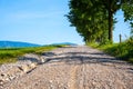 A hiking path leading through a green meadow in a Bavarian nature reserve near the Alps. Amazing scenery Royalty Free Stock Photo