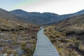 Hiking path leading through lava valley at Tongariro national park in New Zealand Royalty Free Stock Photo