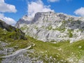 Hiking path in the Swiss Alps with Sulzfluh in the background. Praettigau, Grisons. Royalty Free Stock Photo