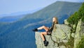 Hiking peaceful moment. Enjoy the view. Tourist hiker girl relaxing edge cliff. Dangerous relax. Extreme concept. On