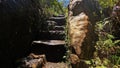 Hiking in rain forest stone stairs, pure unattached nature, Isalo national park