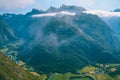 Hiking on the ridge of Romsdalseggen in Norway Royalty Free Stock Photo