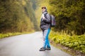 Senior 60 years old woman hiker smiling walk in autumn forest. Active retirement concept Royalty Free Stock Photo