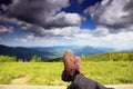 Hiking shoes. Hiker enjoying view relaxing Royalty Free Stock Photo