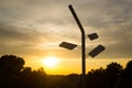 Hiking signpost at sunrise Royalty Free Stock Photo