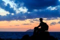 Hiking silhouette backpacker, man trail runner in mountains Royalty Free Stock Photo