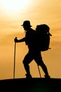 Hiking silhouette in mountains