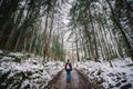 Hiking through the snow filled forest