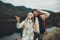 Hiking, stress and lost couple with a phone in nature for direction, map or navigation with anxiety. Backpacking, travel Royalty Free Stock Photo