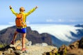 Hiking success, happy woman in mountains Royalty Free Stock Photo