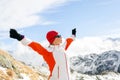 Hiking success, woman in winter mountains Royalty Free Stock Photo