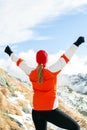 Hiking success, woman in winter mountains Royalty Free Stock Photo