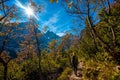 hiking to mountain lake in National Park High Tatra in autumn and sunny day. Dramatic overcast sky. Zelene pleso, Slovakia Royalty Free Stock Photo