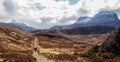 Hiking to Suilven Mountain Peak in the Scottish Highlands, United Kingdom.