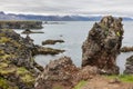 Hiking trail Anarstapi to Hellnar along rocky coast Iceland